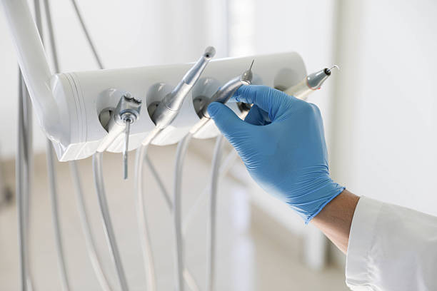 Professional Tooth Extraction technician working in Cathedral City, CA